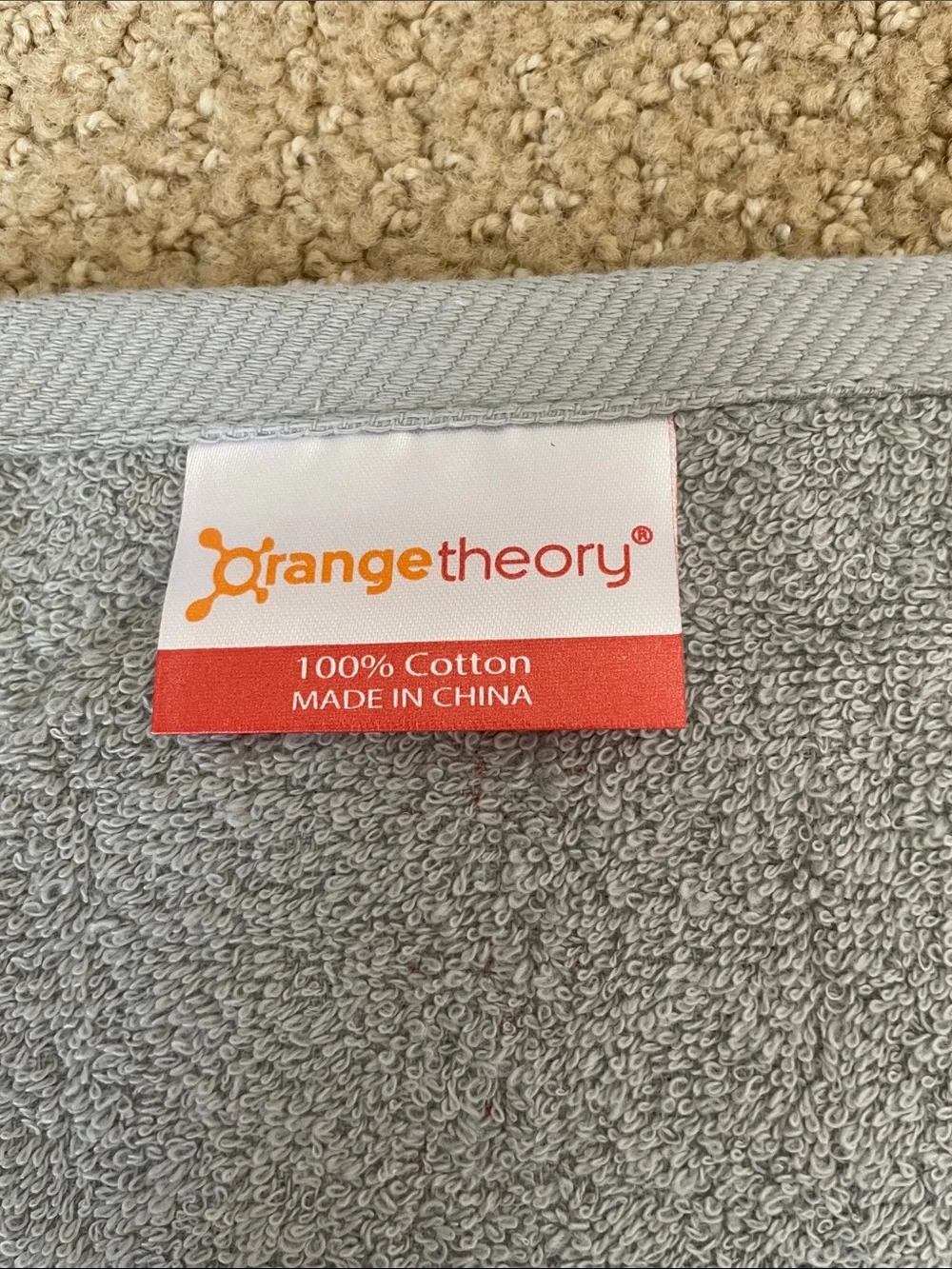 Orangetheory Gray Towel with Orange Logo Tag